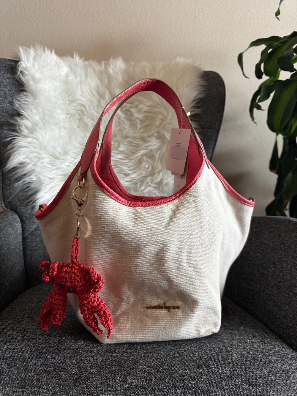 Nanette Lepore Cream Canvas Tote with Red Trim and Crochet Charm